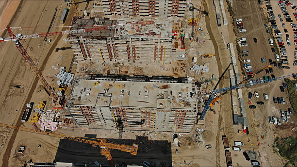 istock Industrial construction site with construction equipment and materials 2250503828
