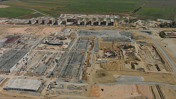 istock Industrial construction site with construction equipment and materials 2250504030
