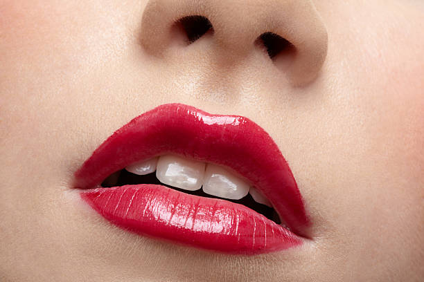 istock beautiful girl's lips 2250505767