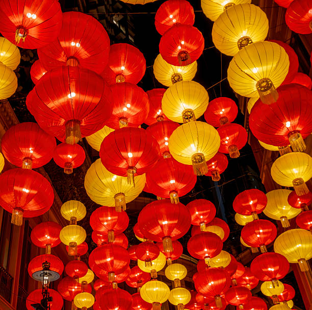 istock Colorful chinese lanterns illuminate evening street 2250506242