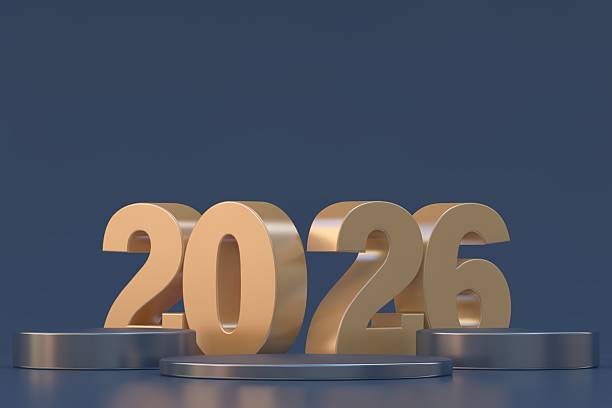 istock 2026 Golden 3D Numbers on Metallic Podiums with Dark Background 2250509046