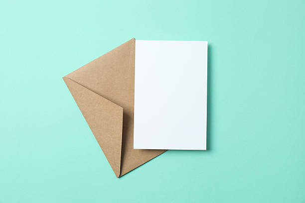 istock White paper card with envelope on color background 2250509153
