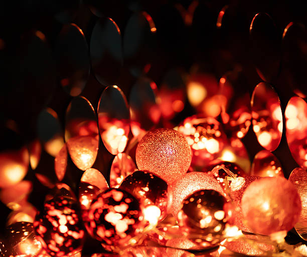 Red Christmas balls with romantic mirrors reflection by hall of mirrors