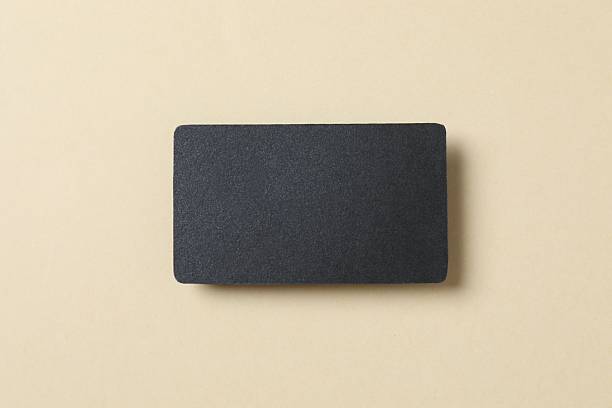 istock Black paper card on color background 2250511007