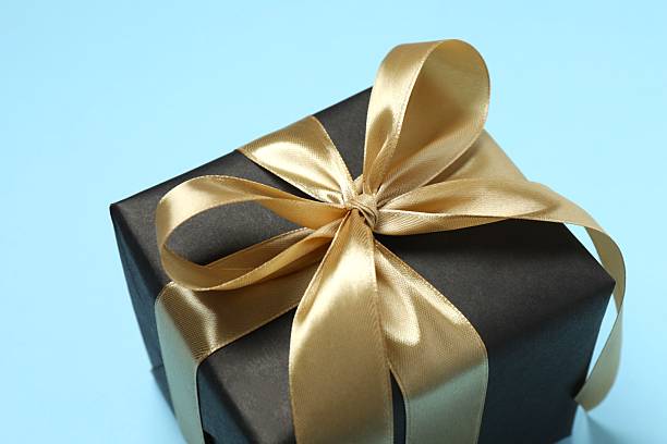 istock Beautiful gift box on color background 2250511158