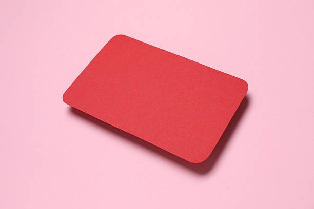istock Red paper card on color background 2250511204