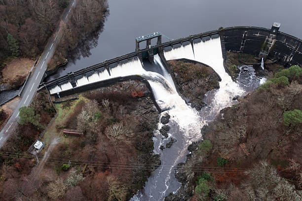 istock Drone view of a dam with over flowing water 2250513219