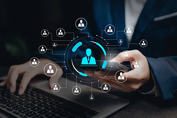 istock People management concept, hand touching human network icons, HR connection system, organizational development, teamwork structure, performance alignment, corporate communication workflow. 2250513247