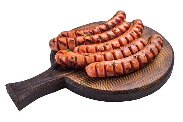 istock Top view of five cooked sausages with distinct grill marks. Excellent for a restaurant menu, food blog, or summer BBQ advertisement. 2250514032
