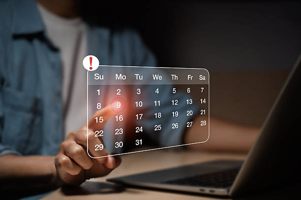 istock Time management concept showing a person planning tasks using a digital calendar and checklist on laptop, emphasizing scheduling efficiency, productivity tools, and online reminders for business goals 2250515821