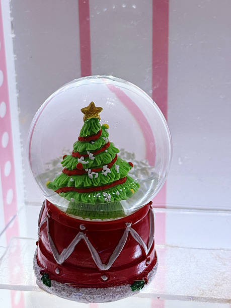 istock Christmas tree in a snow globe. Christmas and New Year concept. 2250519502
