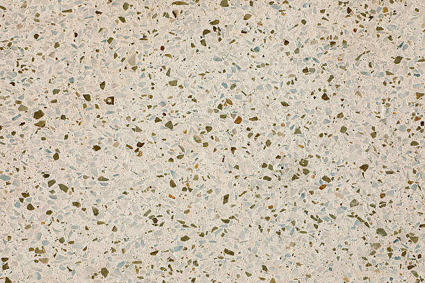 istock Terrazzo with organically scattered stone fragments creates a refined, nature-driven texture perfect for modern interiors, product mockups, and clean, minimalist backgrounds. 2250521908