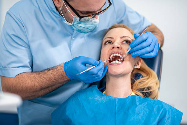 istock Dental check-up with patient at clinic during daylight hours 2250524194