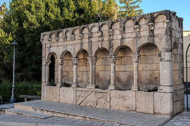 An archways decorated with christian symbols. Castel di Tora old town. province of Rieti. Lazio. Italy.
