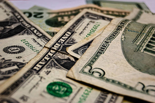 istock Close-Up Dollar Bills Layered With Crumpled Textures Featuring Security Details For Investment Growth 2250530546