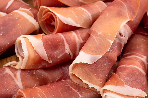 istock Jamon serrano. A Spanish ham texture background. Traditional spanish jamon sliced. Dry cured meat ham hamon iberico 2250531428