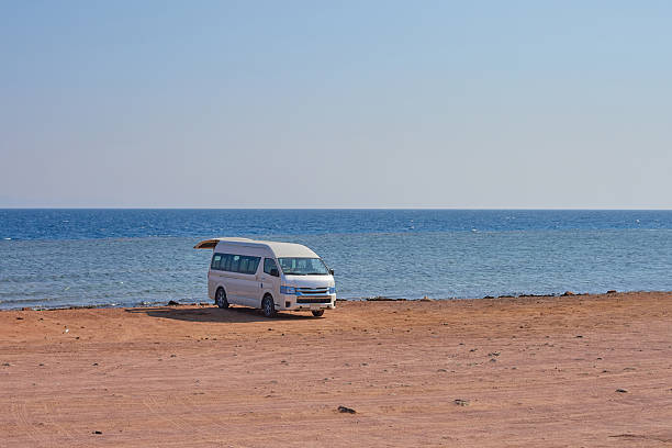 Motorhome on a sandy beach by the sea