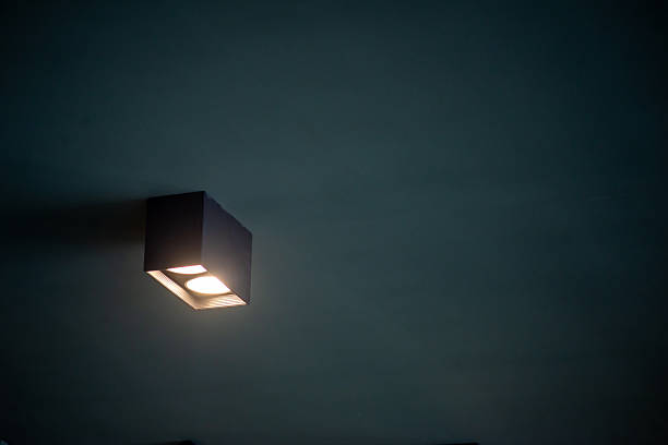 istock Modern Ceiling Light Fixture in Dark Room 2250534071