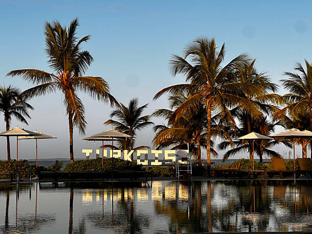 Turks and Caicos Islands (/ˈtɜːrks/ and /ˈkeɪkəs, -koʊs, -kɒs/) are a British Overseas Territory consisting of the larger Caicos Islands and smaller Turks Islands, two groups of tropical islands in the Lucayan Archipelago of the Atlantic Ocean and northern West Indies.[