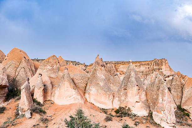 istock Fairy chimney rocks  in Devrent Valley viewpoint, Turkey, at cloudy day 2250538772