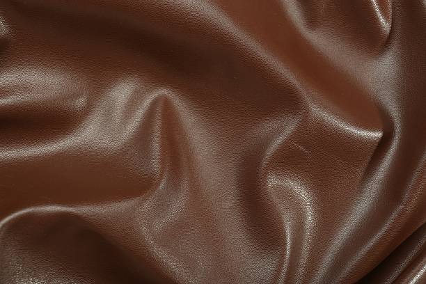 istock Brown natural leather as background, top view 2250542559