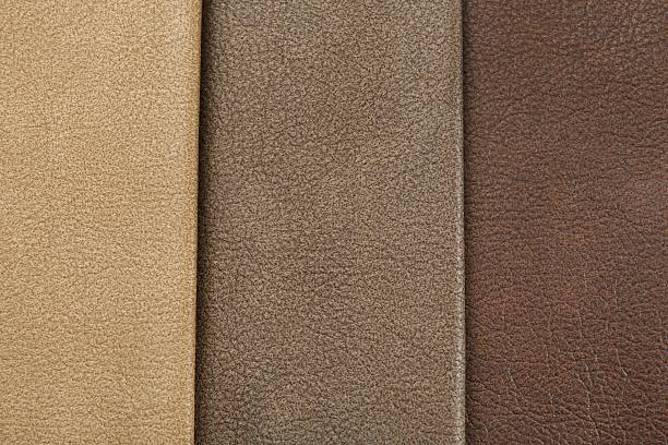 istock Different natural types of leather as background, top view 2250542574