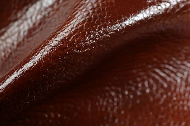 istock Beautiful red leather as background, closeup view 2250542626