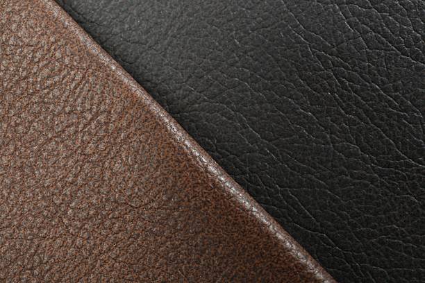 istock Brown and black types of leather as background, above view 2250542646
