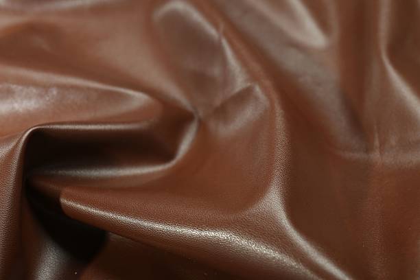 istock Brown natural leather as background, closeup view 2250542685