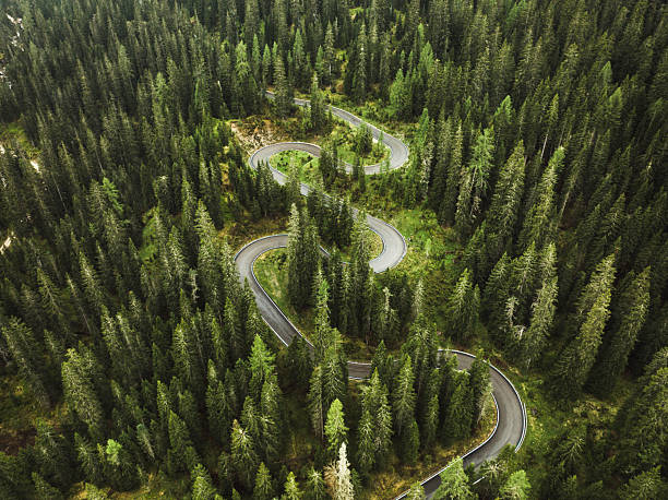 istock alpine winding road from above 2250545119