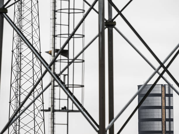 istock Construction site showing metal structures and a tower in an industrial area on a cloudy day 2250549720