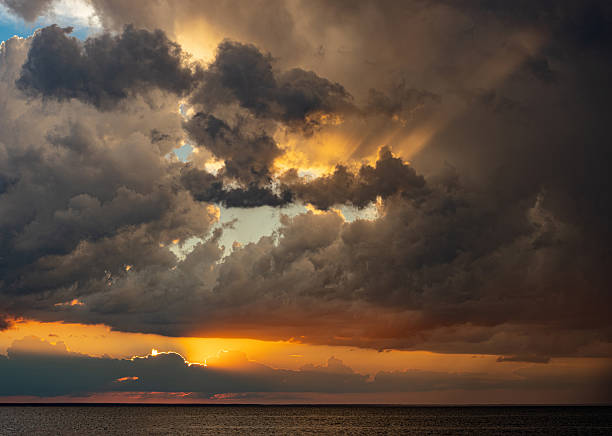 istock Panoramic seascape with dramatic stormy sky and sun rays 2250551807