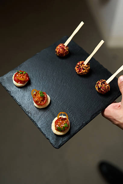 istock Gourmet Appetizers on a Black Serving Tray 2250551966