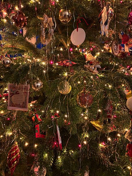 istock Lights and decorations on a traditional Christmas tree 2250554184