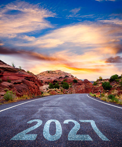 istock New Year 2027 on Empty Road at sunrise 2250554418