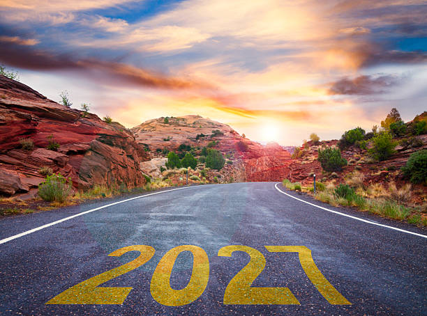 istock New Year 2027 on Empty Road at sunrise 2250554421
