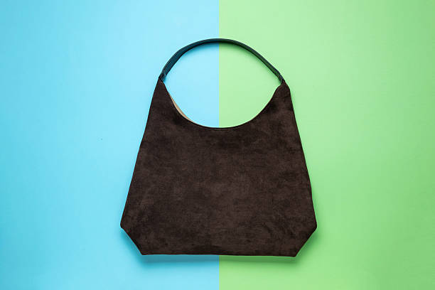 Minimalist Brown Suede Handbag on Colorful Split Background