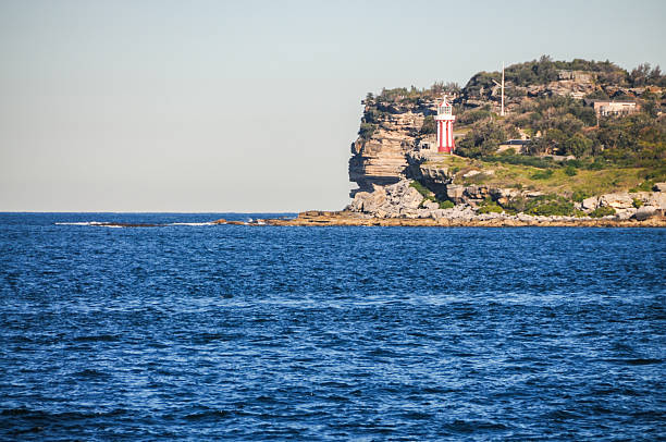 Sydney, Australia - July 25, 2009. Outdoor scene showing a lighthouse along the Sydney harhour coastline.