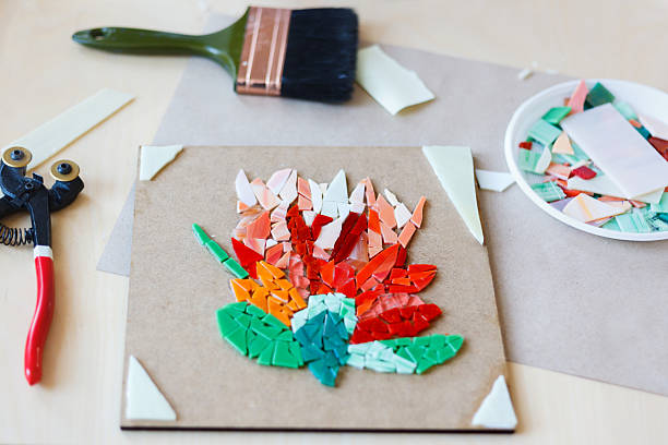 istock The process of creating a flower from colored glass. 2250559856