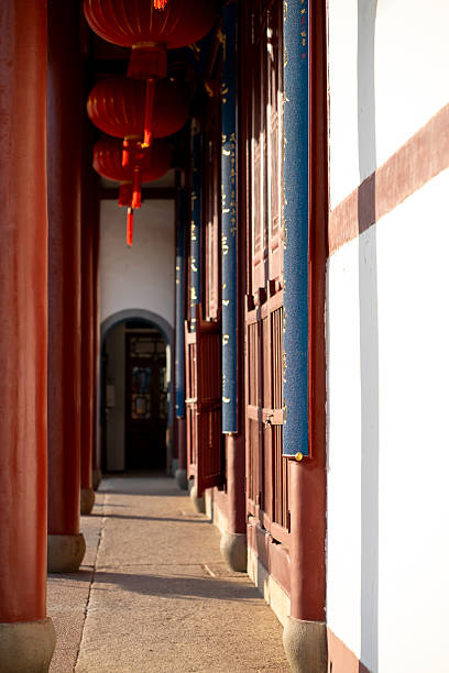 istock Traditional Chinese Courtyard Hallway with Red Lanterns 2250563583