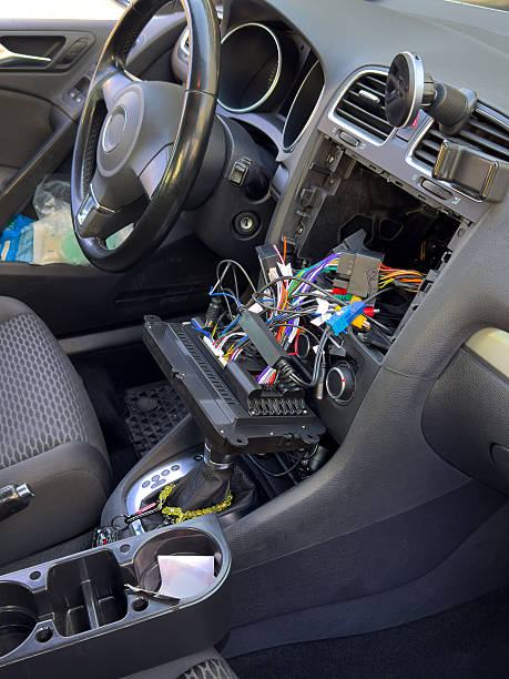 istock Car dashboard navigation and radio system repair 2250567409