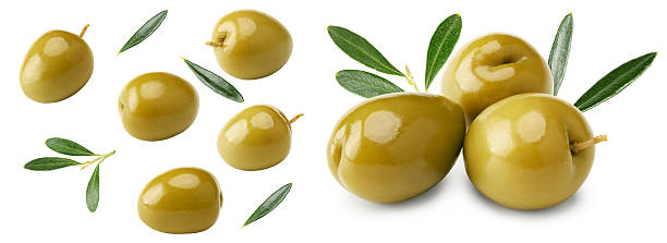istock green olives with green leaves isolated on white background. clipping path 2250568886