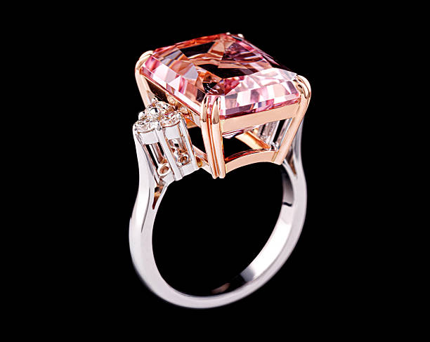 istock white metal ring, silver, gold with morganite stone and diamonds on black background 2250569197