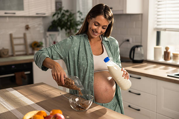 istock Pregnant Woman Making Breakfast 2250570915