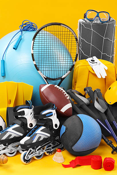 istock Many different sports equipment on yellow background 2250586786