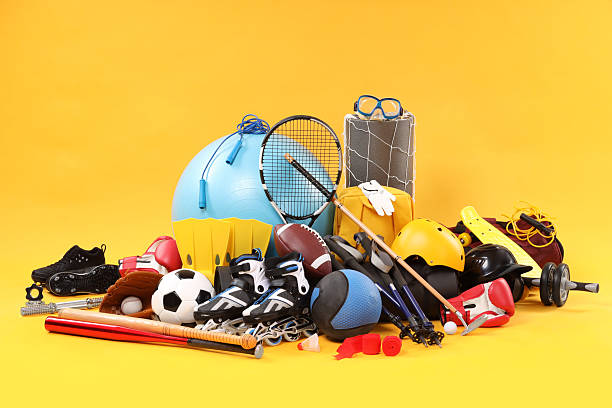 istock Many different sports equipment on yellow background 2250586787