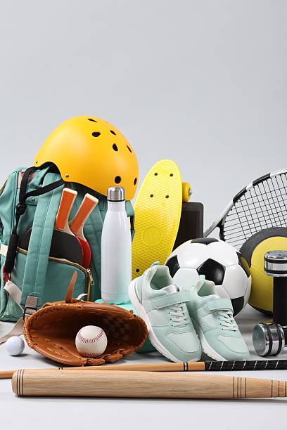 istock Many different sports equipment on light grey background 2250586793