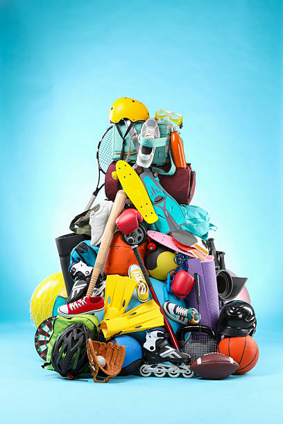 istock Many different sports equipment on light blue background 2250586805