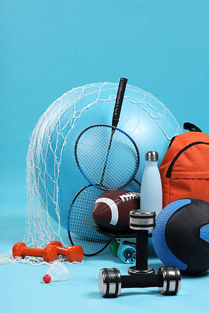 istock Many different sports equipment on light blue background 2250586878