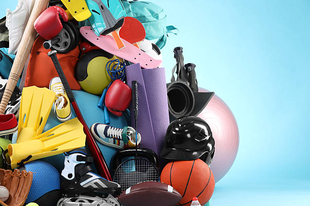 istock Many different sports equipment on light blue background 2250586897